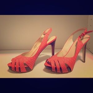 Peep toed coral heels